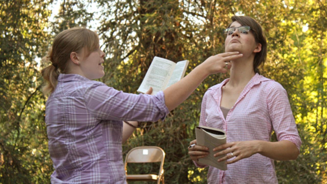 Photo: Steph Hankinson and Cody Granger rehearse the play "The Importance of Being Earnest"