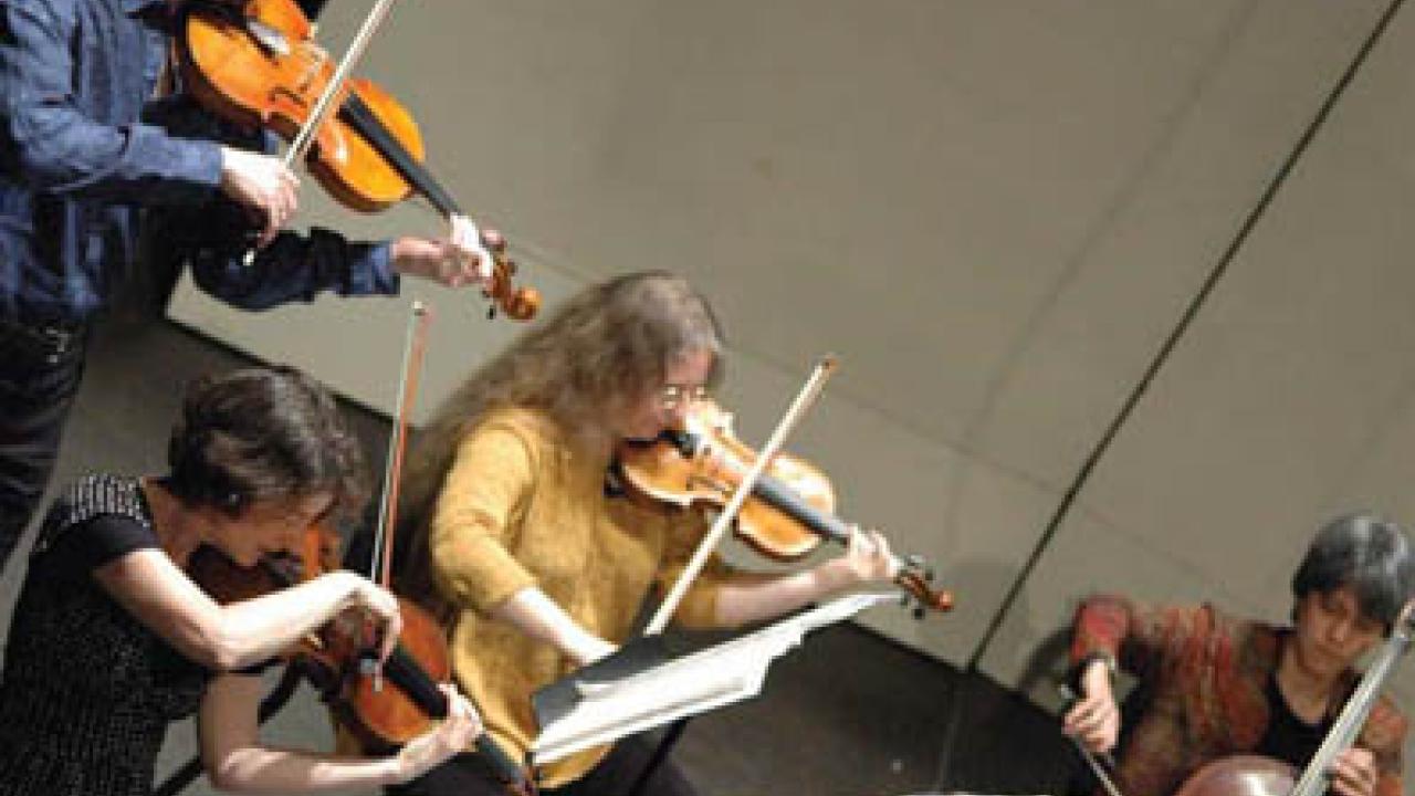 Pictured in a 2007 concert are Kurt Rohde, viola; Ellen Ruth Rose , viola; Terri Baune, violin; and Thalia Moore, cello.
