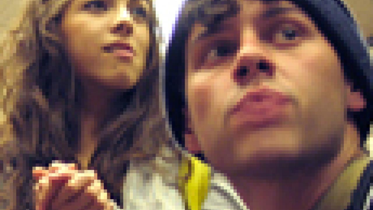 Faces of demonstrators at protest.