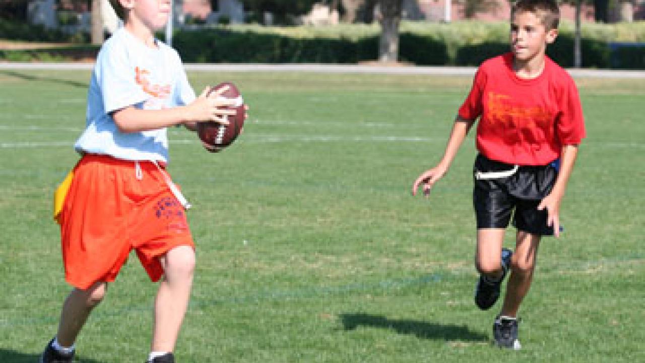 Participants in last year's Flag Football Frenzy included Christopher Prince and Willie Hall.