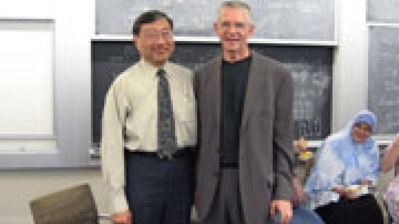 Craig Tracy, right, and Winston Ko, physical sciences dean.
