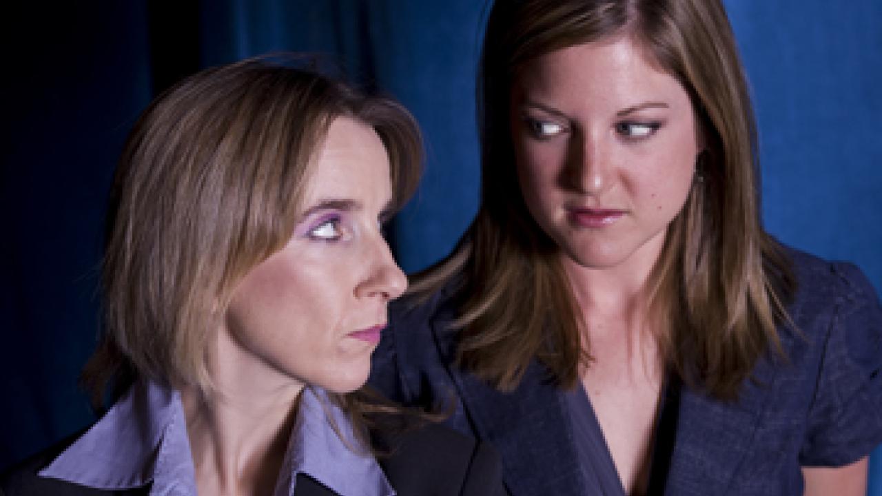 Bella Merlin, a professor in the Department of Theatre and Dance, and graduate student Anne Reeder rehearse a scene from Elephant's Graveyard. 