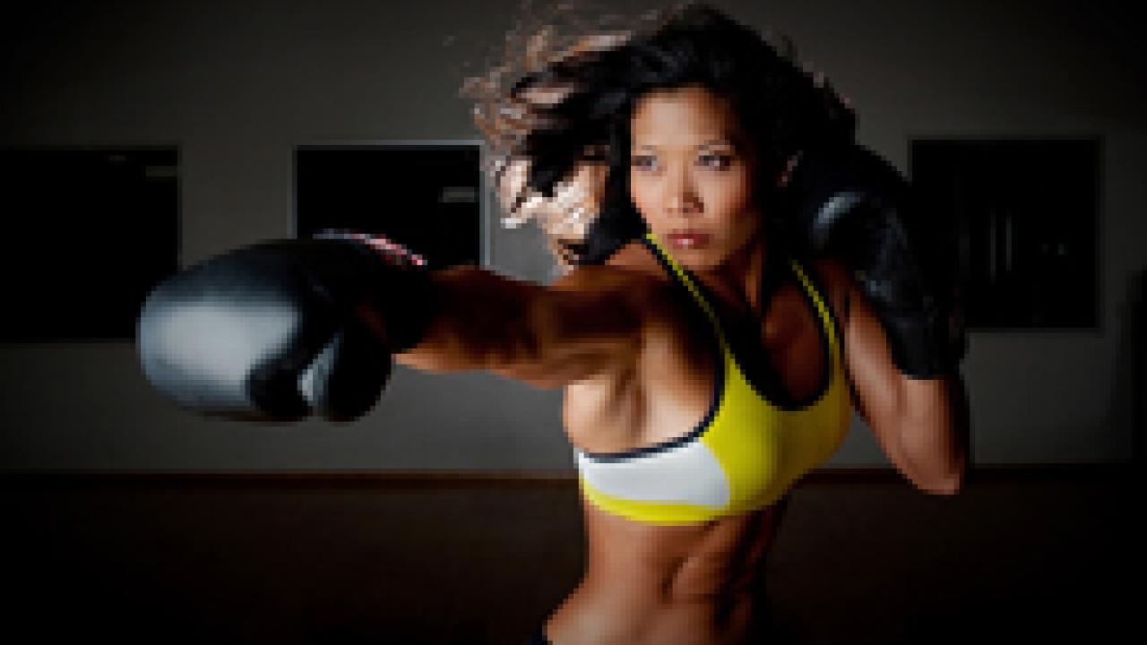 Fitness instructor Andrea Khoo teaches kickboxing, step aerobics, weight training, and competes as a bodybuilder.