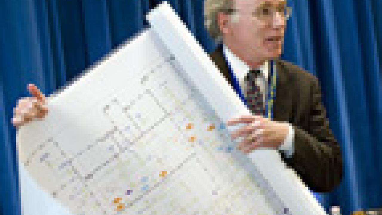 Professor Jay Lund at UC Day forum, showing schematic of the state water system.