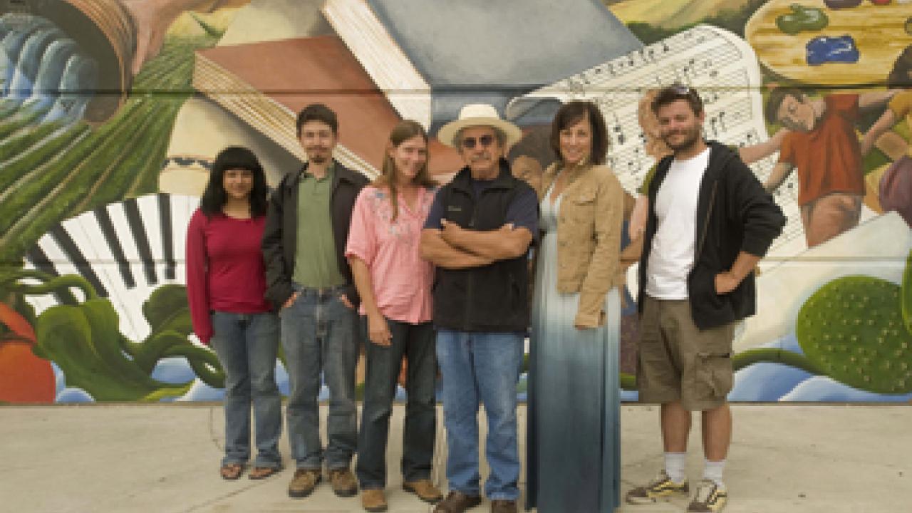 New mural, Pioneer, at Woodland High School, with Malaquias Montoya and student artists.