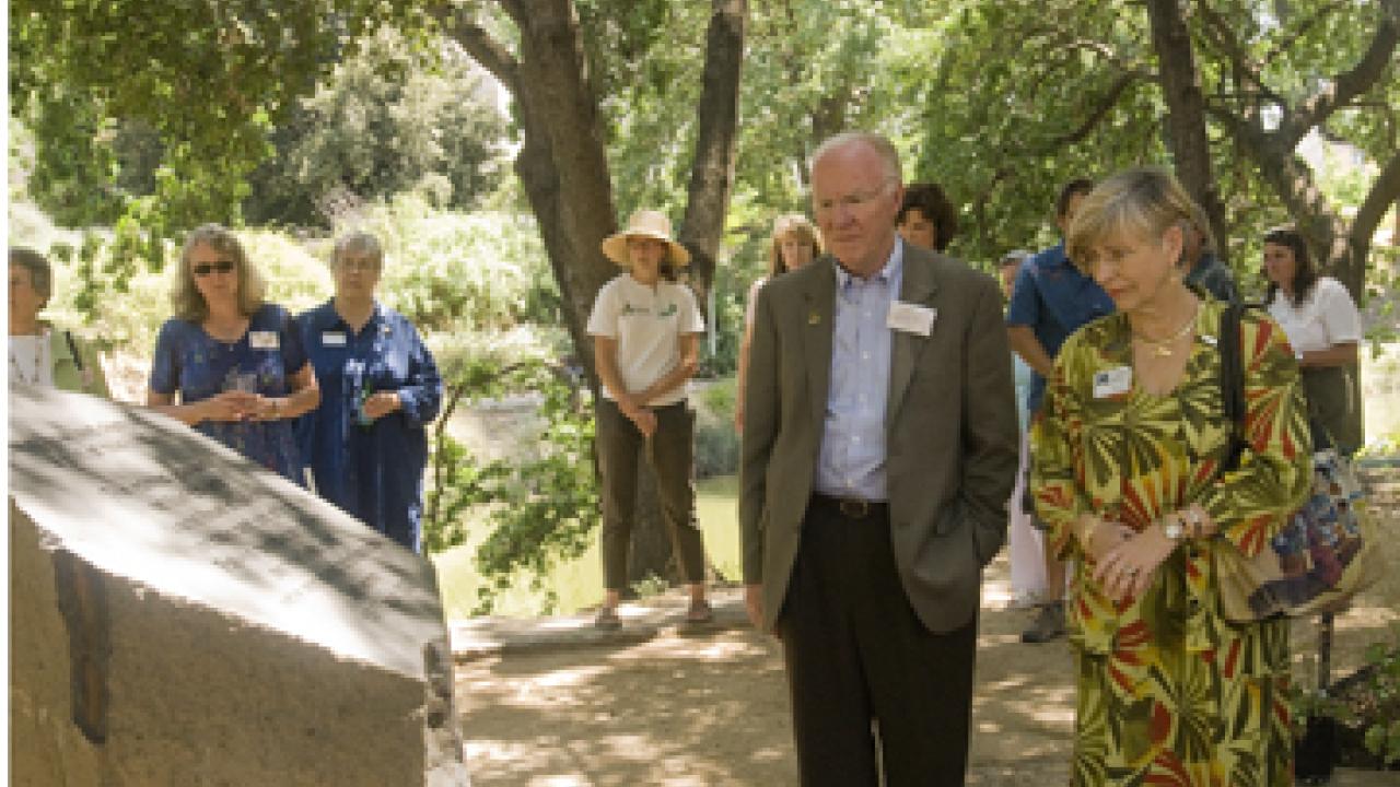 Larry Vanderhoef and Virginia Hinshaw visit the new reflective area honoring American Indians.