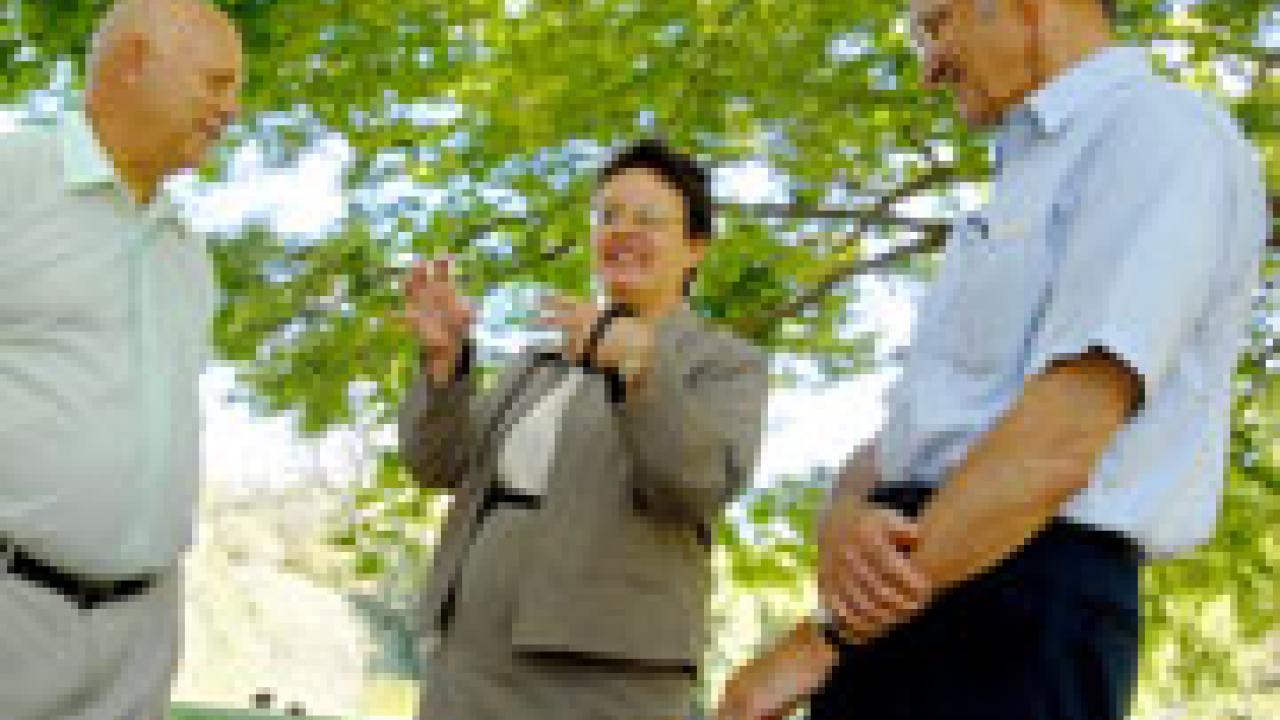 Retiree Center coordinator Doreen Barcellona Strnad is flanked by Bob Halferty, left, president of the Retirees Association, and Dick Walters, president of the Emeriti Association.

