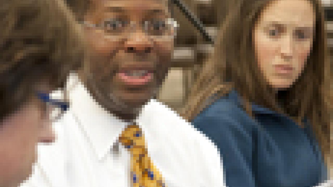 Photo: Charles Robinson, UC vice president and general counsel, addresses town hall participants.