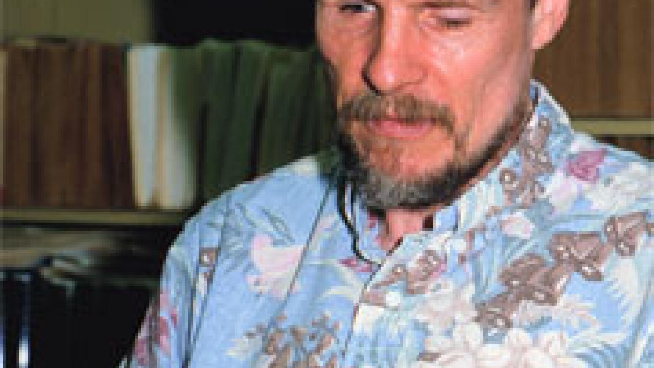 Photo: man examining shell