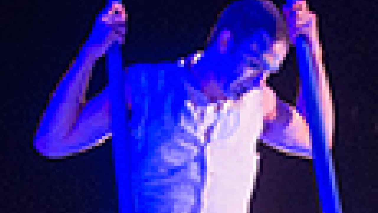 Photo: Acrobat under the awning of the Mondavi Center for the Performing Arts