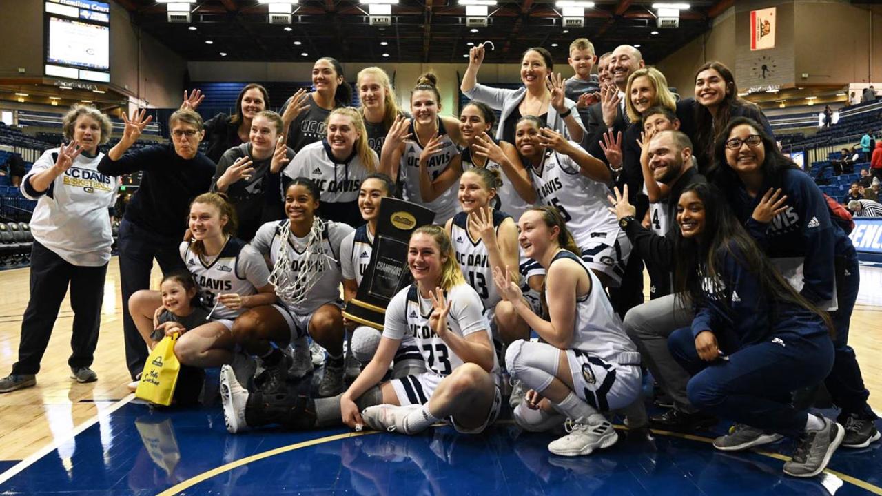 Team celebration photo, on the court.