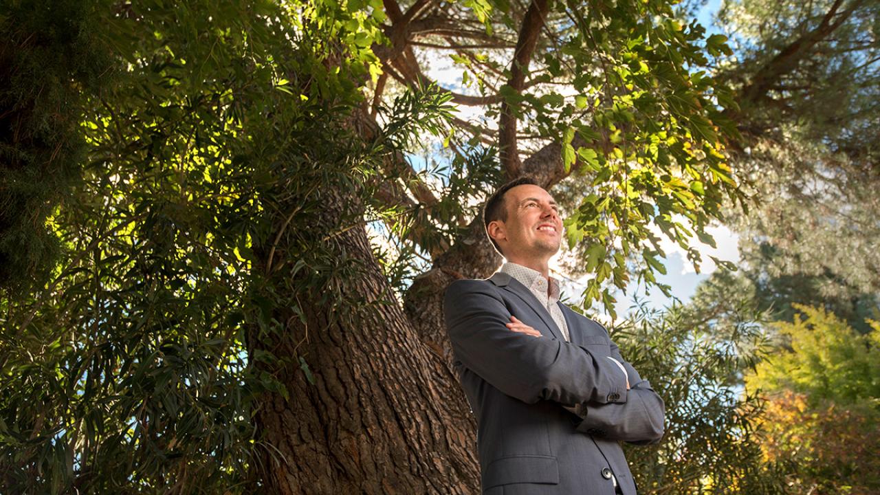 Professor Ben Houlton and a tree.