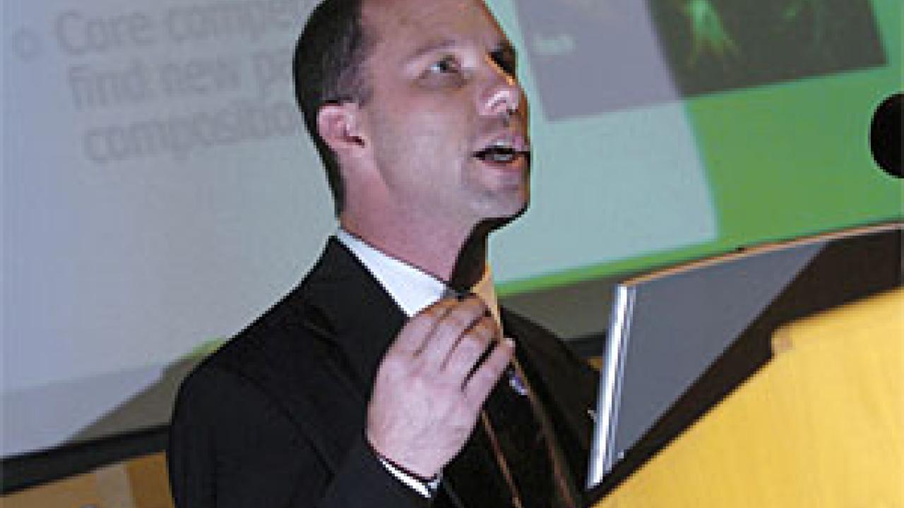 Photo: man talking at podium