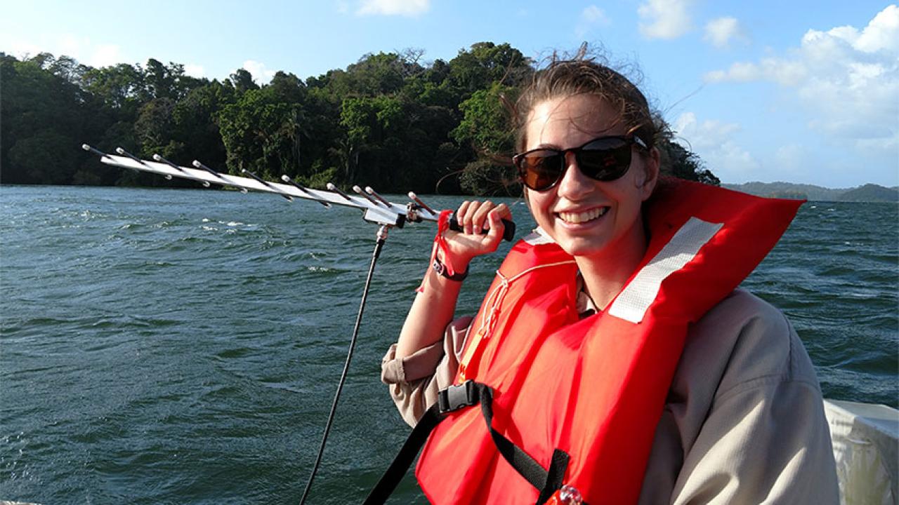 A woman wearing a life jacket