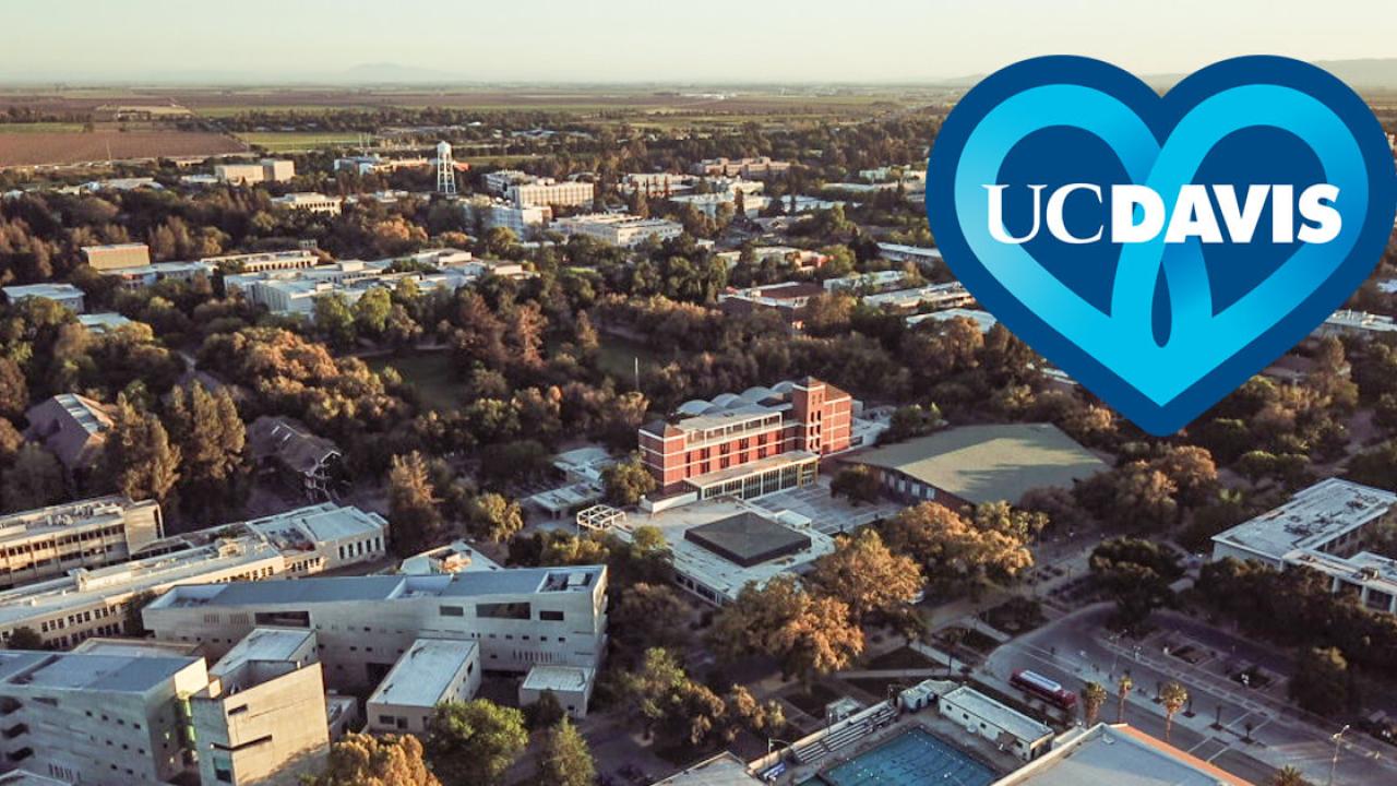 Aerial photo of UC Davis campus with blue heart icon overlaid.