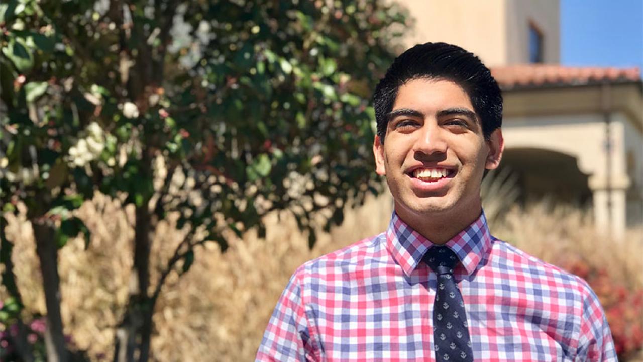 Daniel Castaneda stands outside