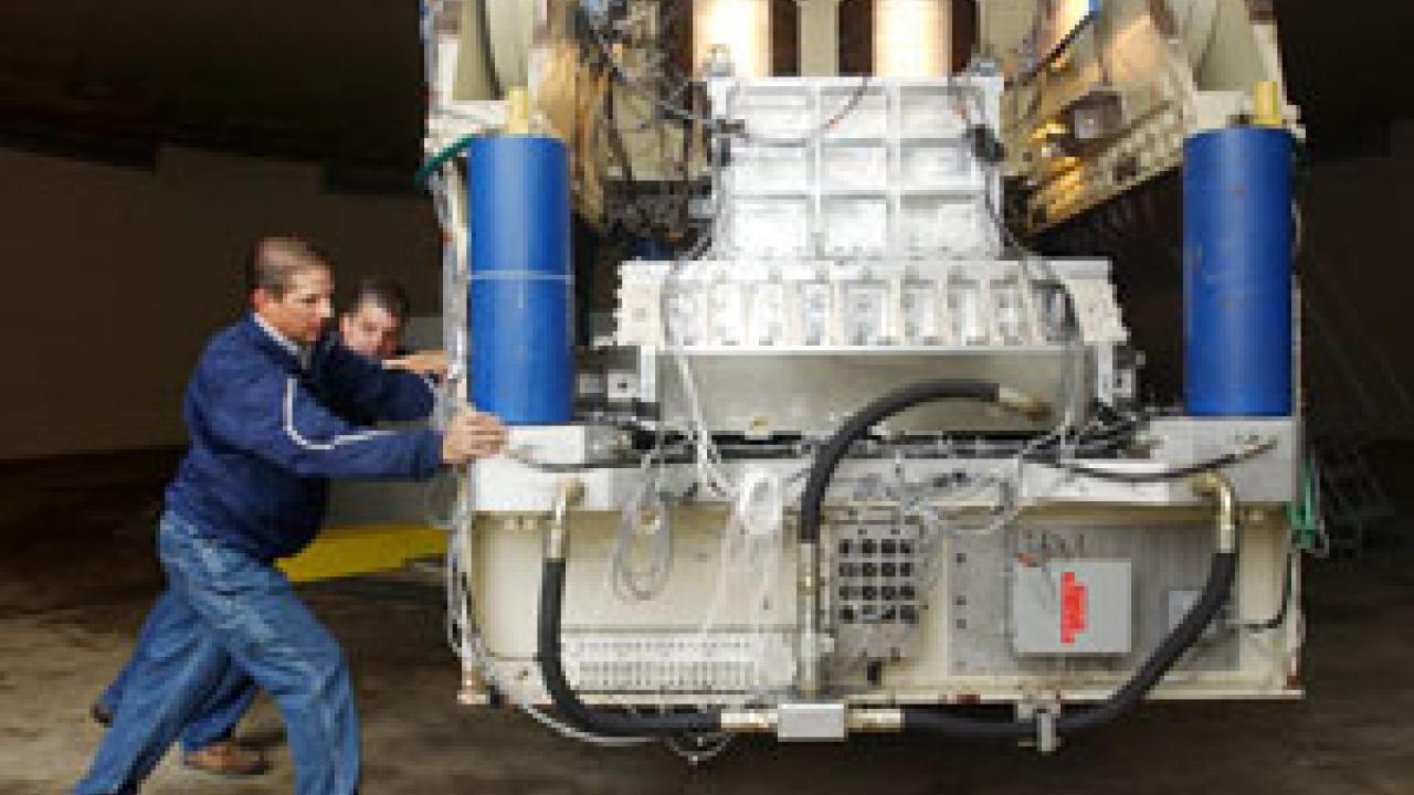 Chad Justice, left, and Tom Kohnke of the Center for Geotechnical Modeling ready the campus&rsquo; upgraded centrifuge for viewing Monday.    It is the largest  hydraulic actuator of its type in the United States.