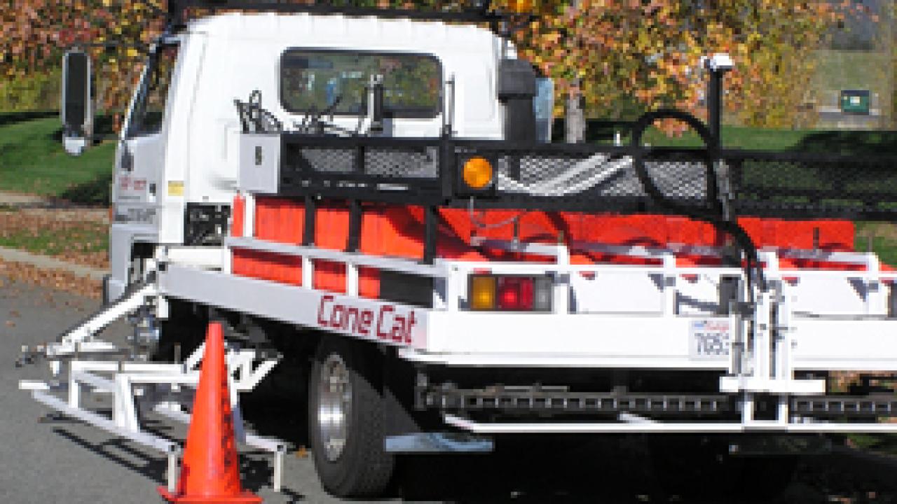 Cone placement and retrieval vehicle.