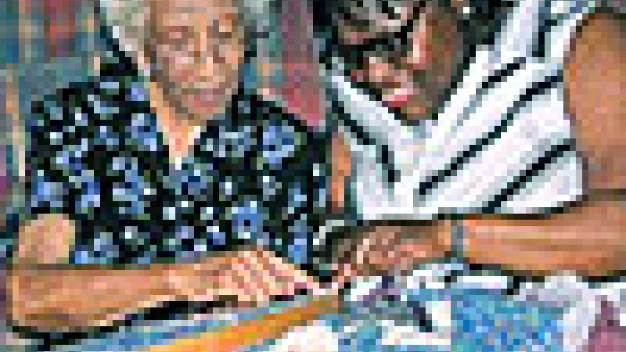 Photo: older and younger woman quilt together (from "Crafted Lives" book cover