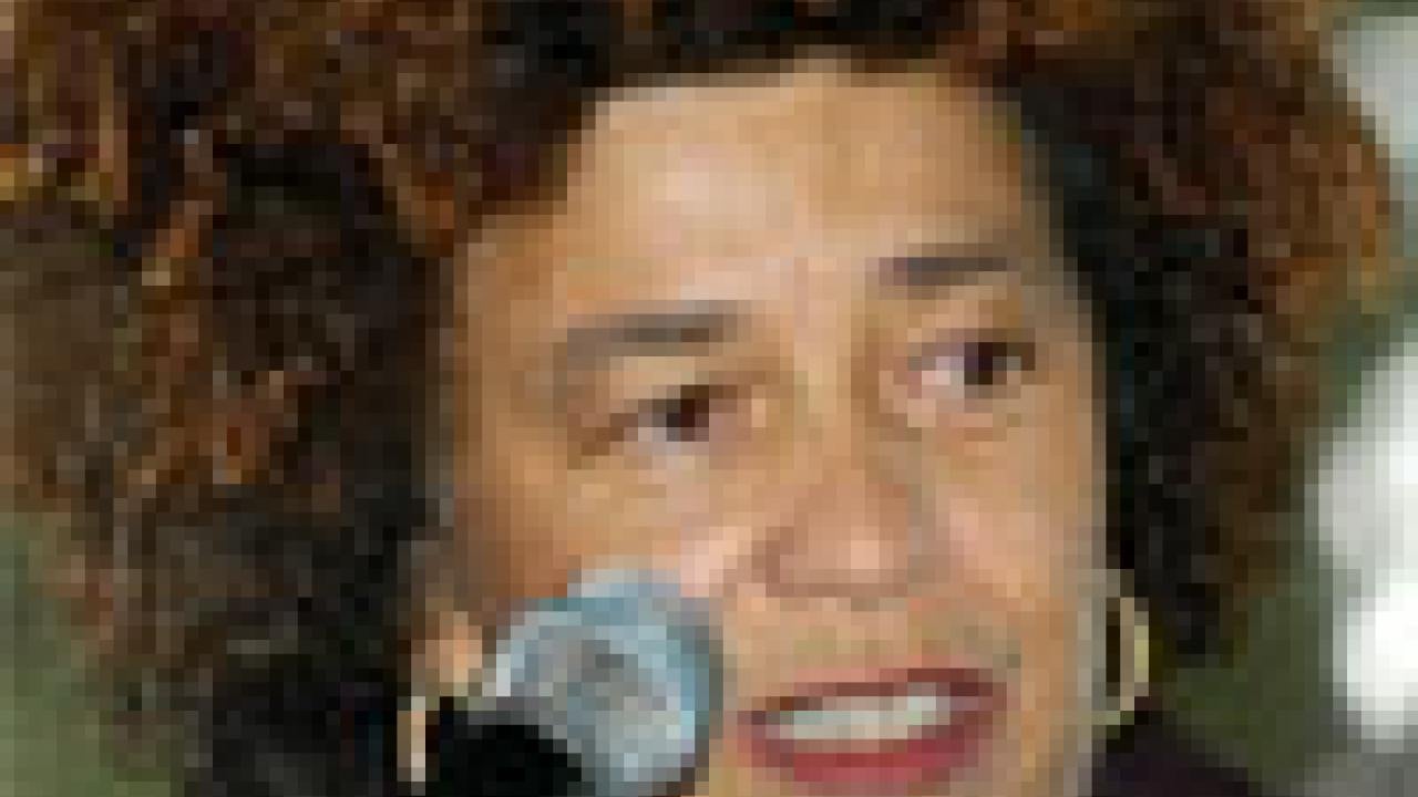 photo: woman at microphone