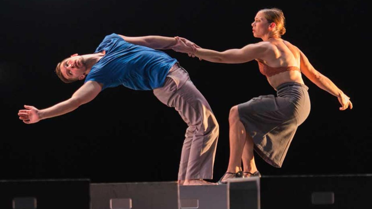 Diavolo dance troupe, two dancers on cubes.