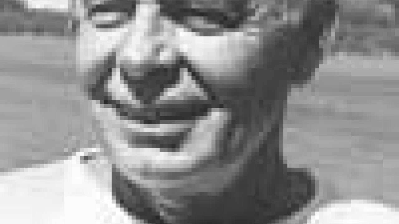 Photo: Dick Lewis in Aggie sweatshirt