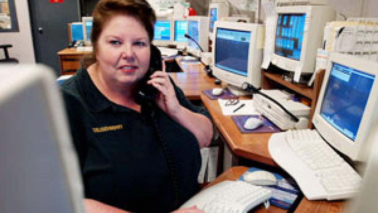 A dare issued by her brother some 20 years ago    ultimately led Cathy &ldquo;CJ&rdquo; Deusenberry to her job on campus as a police dispatcher. 