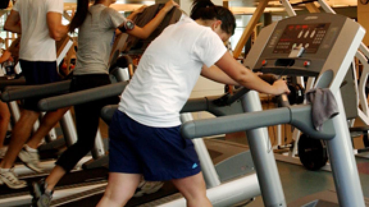 Men and women on treadmills: Going through the paces at the Activities and Recreation Center.