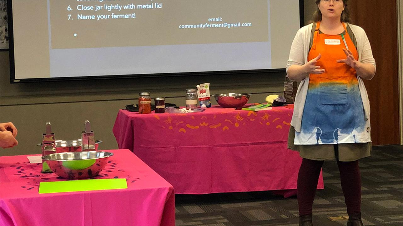 Instructor wearing apron.