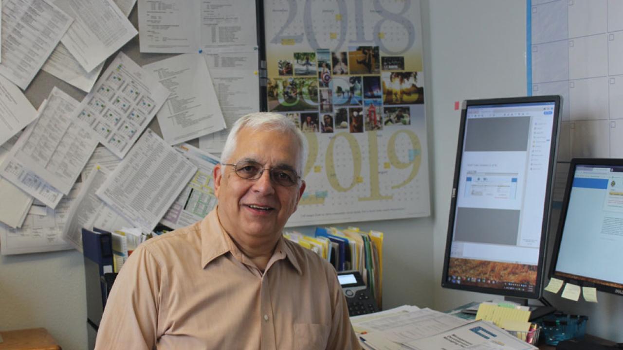 Francisco Andrade at desk