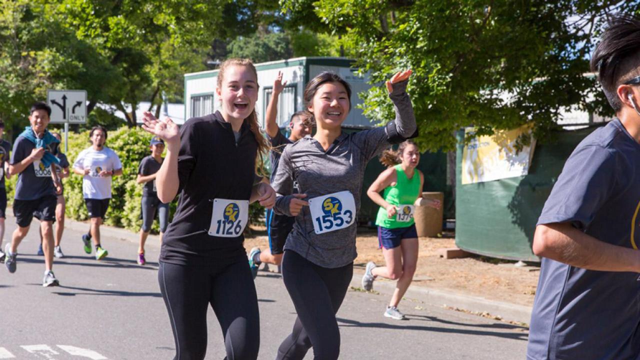 Runners having fun in Stride for Aggie Pride 2017.