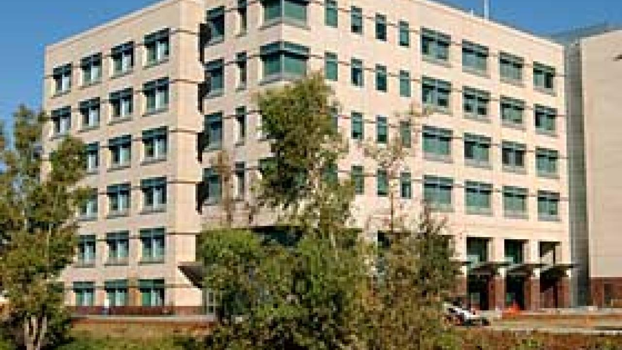 photo: building with trees in foreground