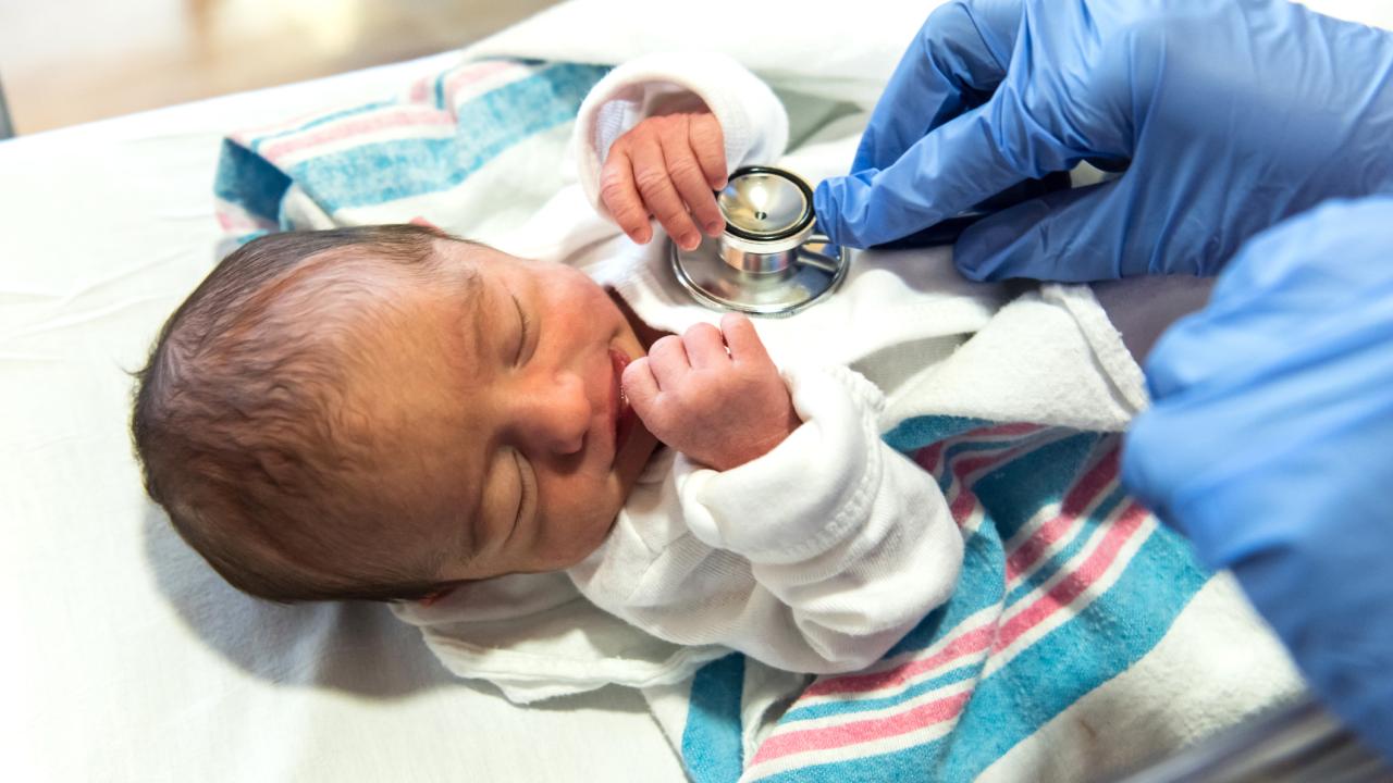 Baby treated by doctor