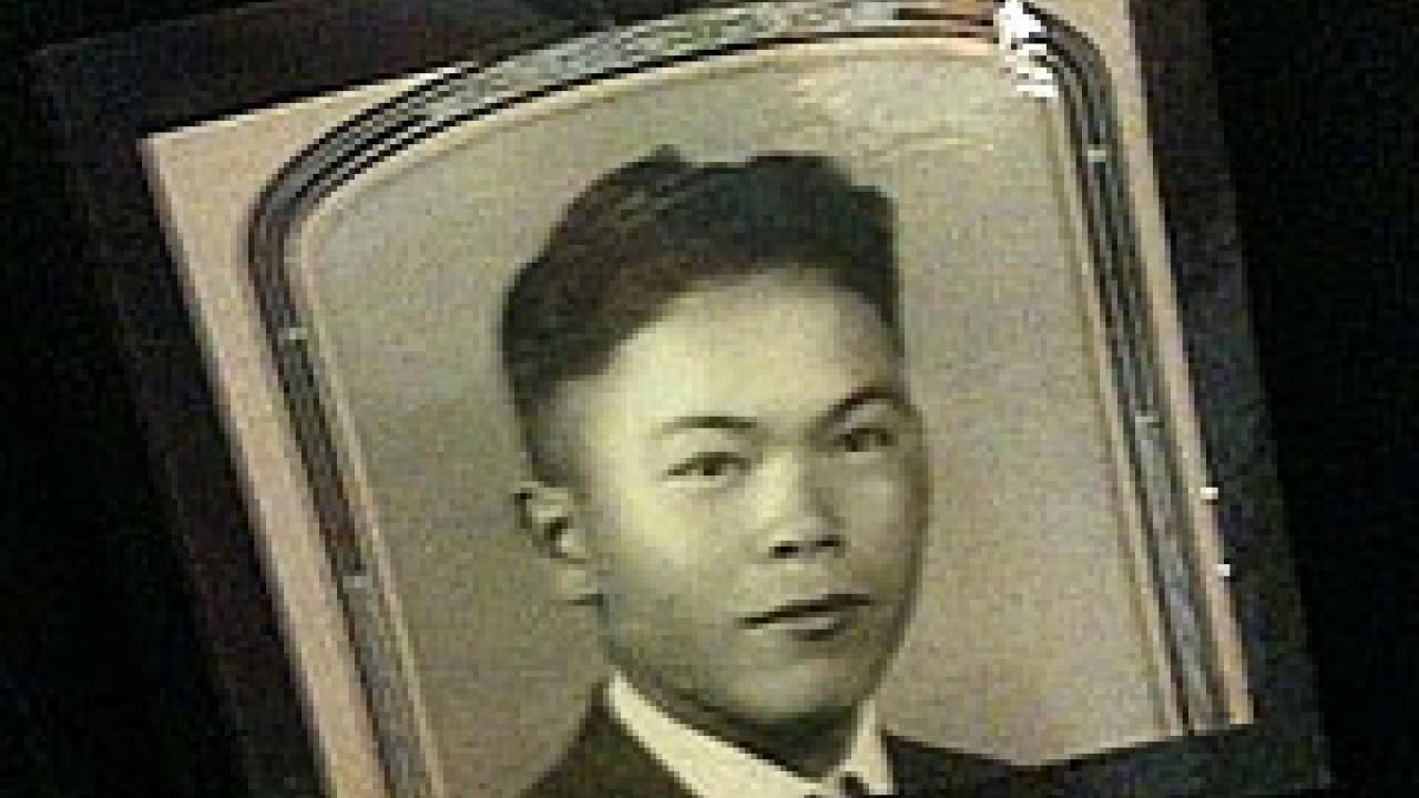 Photo: of a vintage badge with Henry Satoru Marubashi's photo