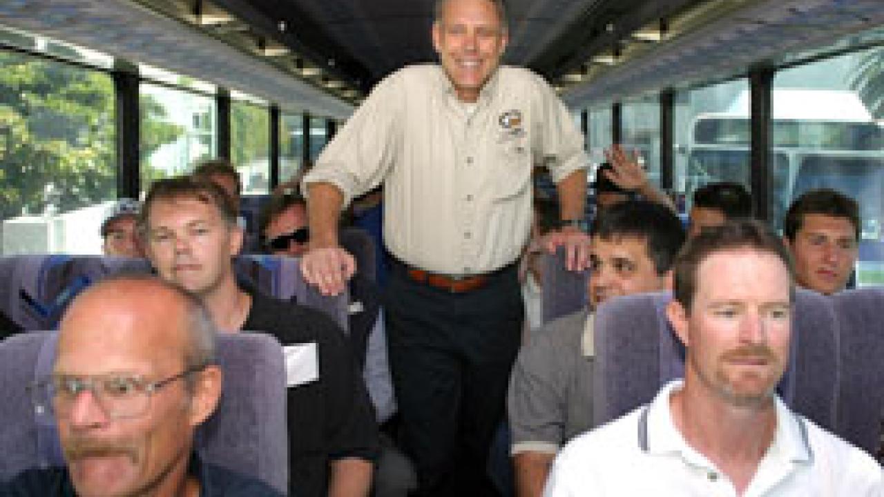 Jeff Hogan, center, takes to the road with fellow UC Davis athletics department staff members and Aggie football players last week to play Weber State in Ogden, Utah.