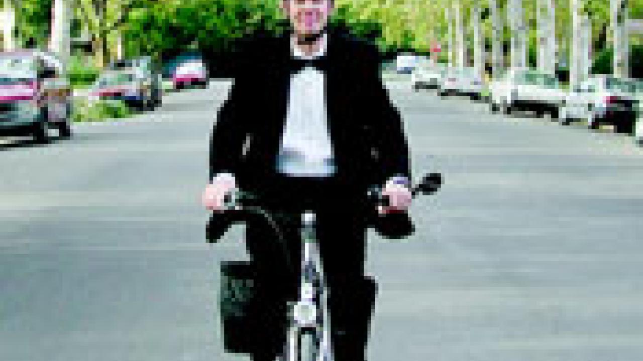 Vice Chancellor for resource management and planning John Meyer, epitomizes the bicycle culture on campus as &Atilde; decked out in formal tuxedo wear &Atilde;  h