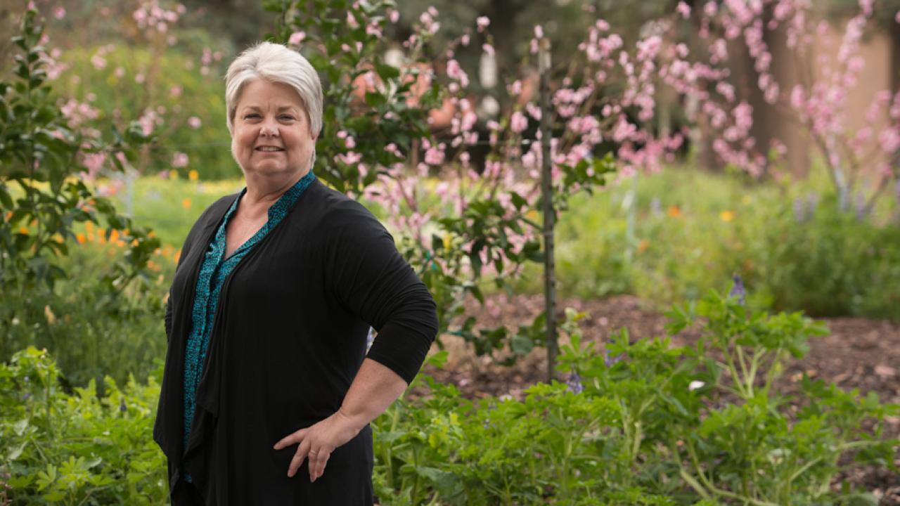 Kerie Holck, environmental portrait, on campus
