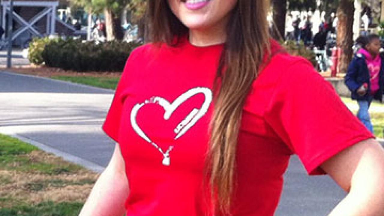 Photo: UC Davis senior Maria &ldquo;Lupe&rdquo; Espinoza, pictured wearing a UC Davis heart T-shirt