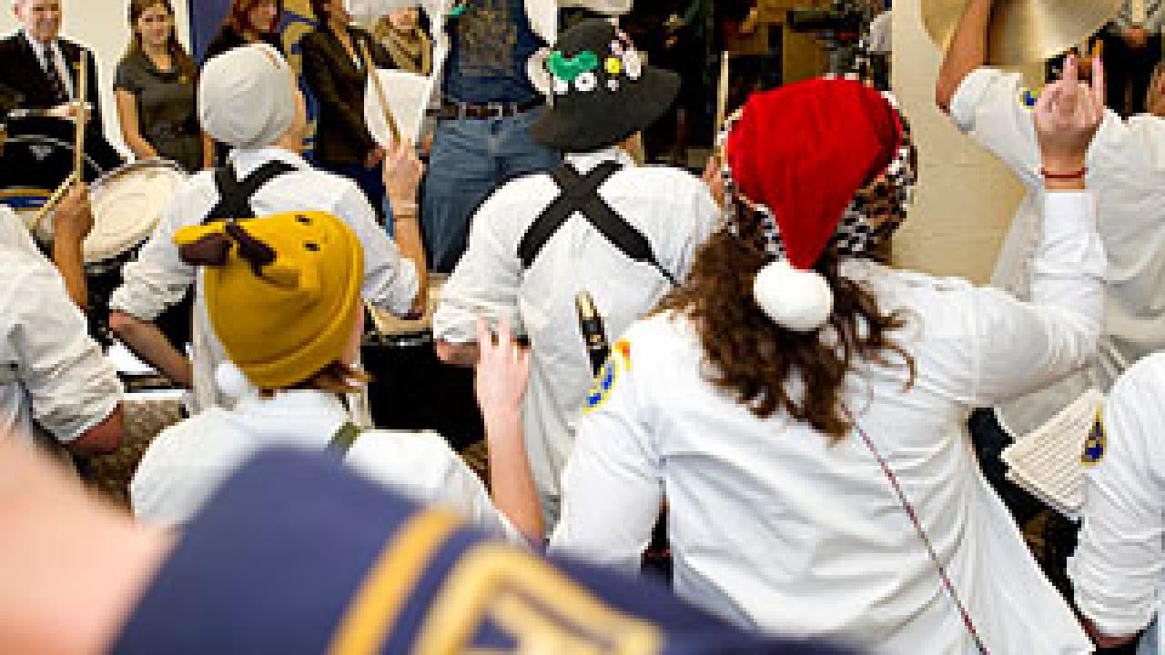 Room full of students and band members 