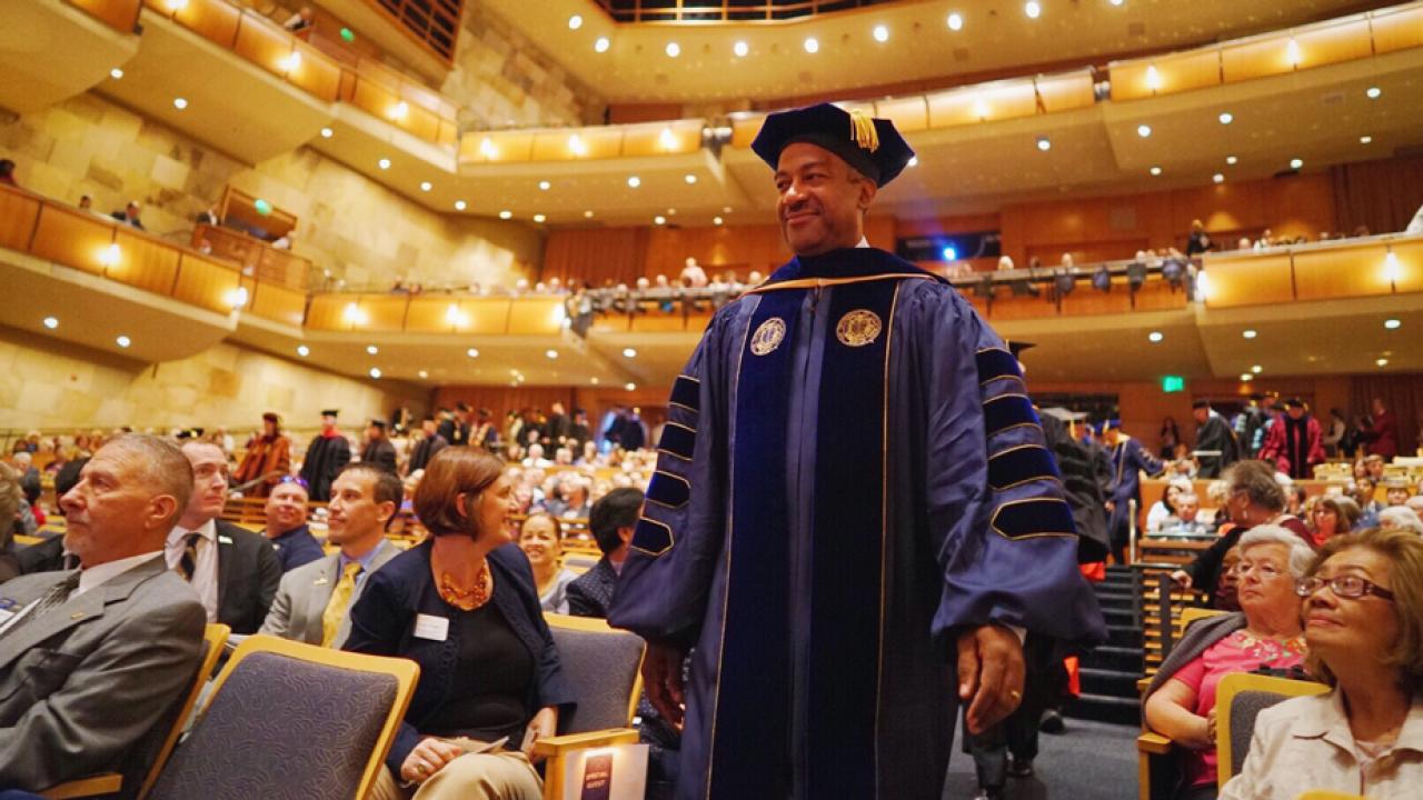 Chancellor May in cap and gown, in the processional
