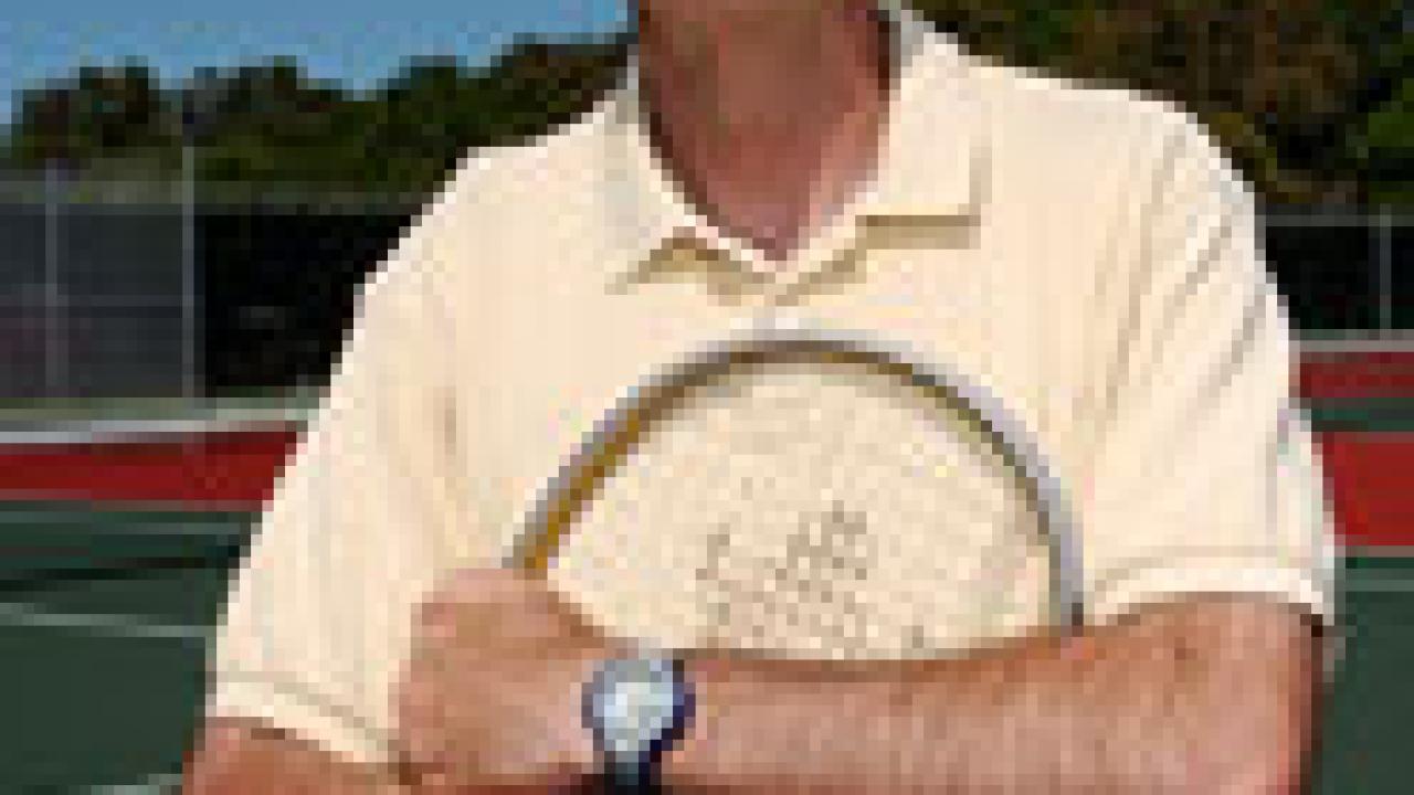 Tennis coach Bill Maze was doubles partner with John McEnroe at Stanford University. He is shown at the new tennis facility, where the first of two phases of construction is complete.