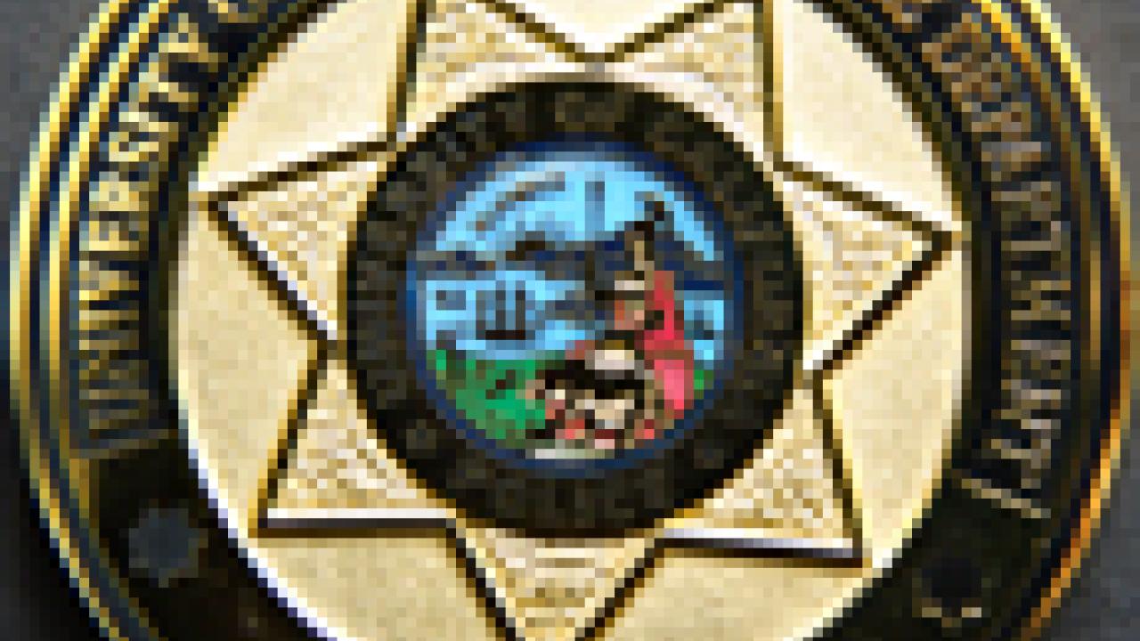 Photo: The police shield side of the UC Davis police medallion