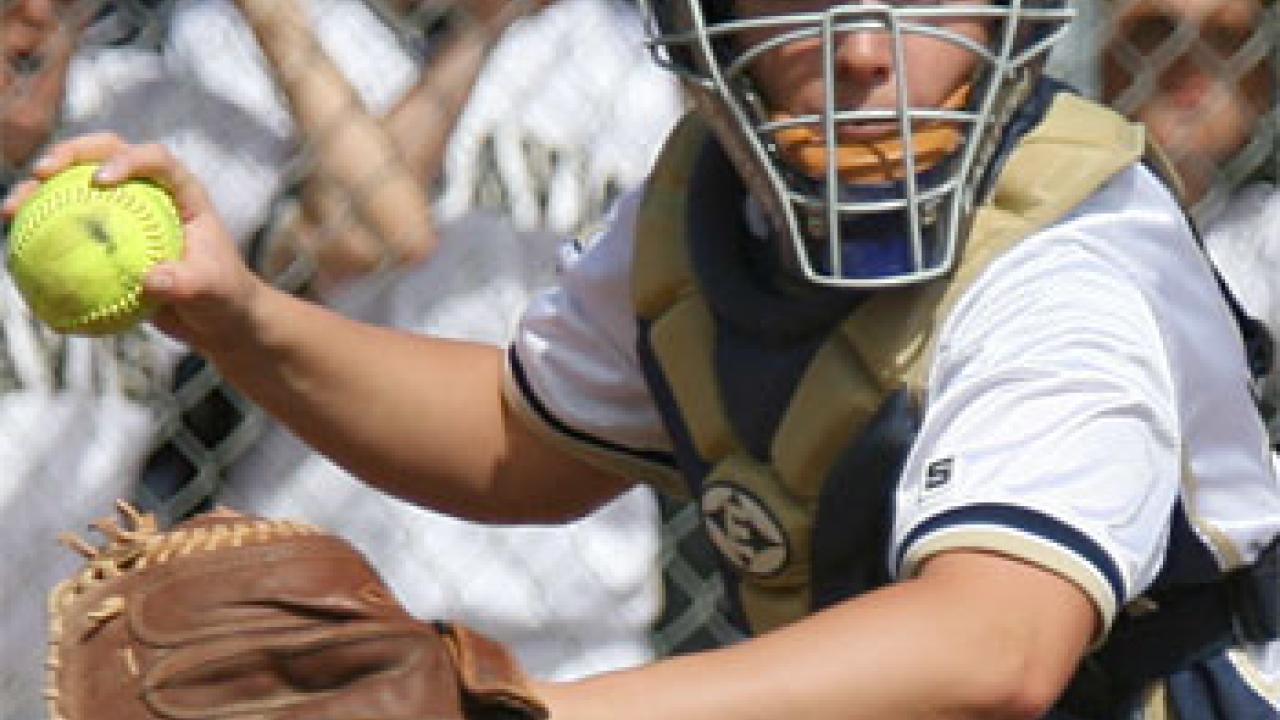 Photo: Deanna Menapace throwing a ball