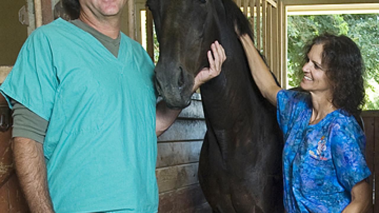Photo:  Jack Snyder, horse and Sharon Spier in horse barn
