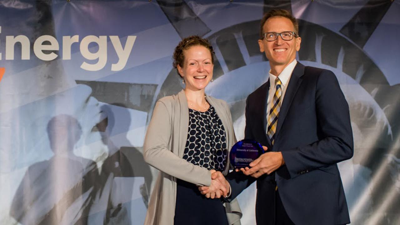 Award presentation and handshake