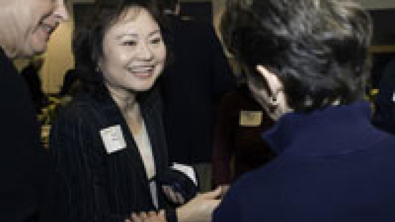 Kim Phuc greets an audience member at the Mondavi Center where Phuc gave a talk on Feb. 5 about her life after being hit by napalm at the age of 9 during the Vietnam War. An 1972 Associated Press photo of Phuc&mdash;screaming from burns and running 