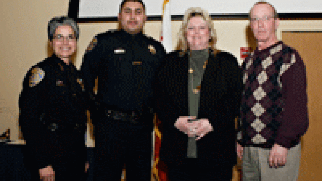 On the front: Marc Hicks and student Melissa Siaotong take a closer look at their awards. Dennis Kisamore could not attend. Inside: UC Davis Police Chief Annette Spicuzza, left, is pictured with Moaz Ahmad (in uniform); Tracey Peterson, second f