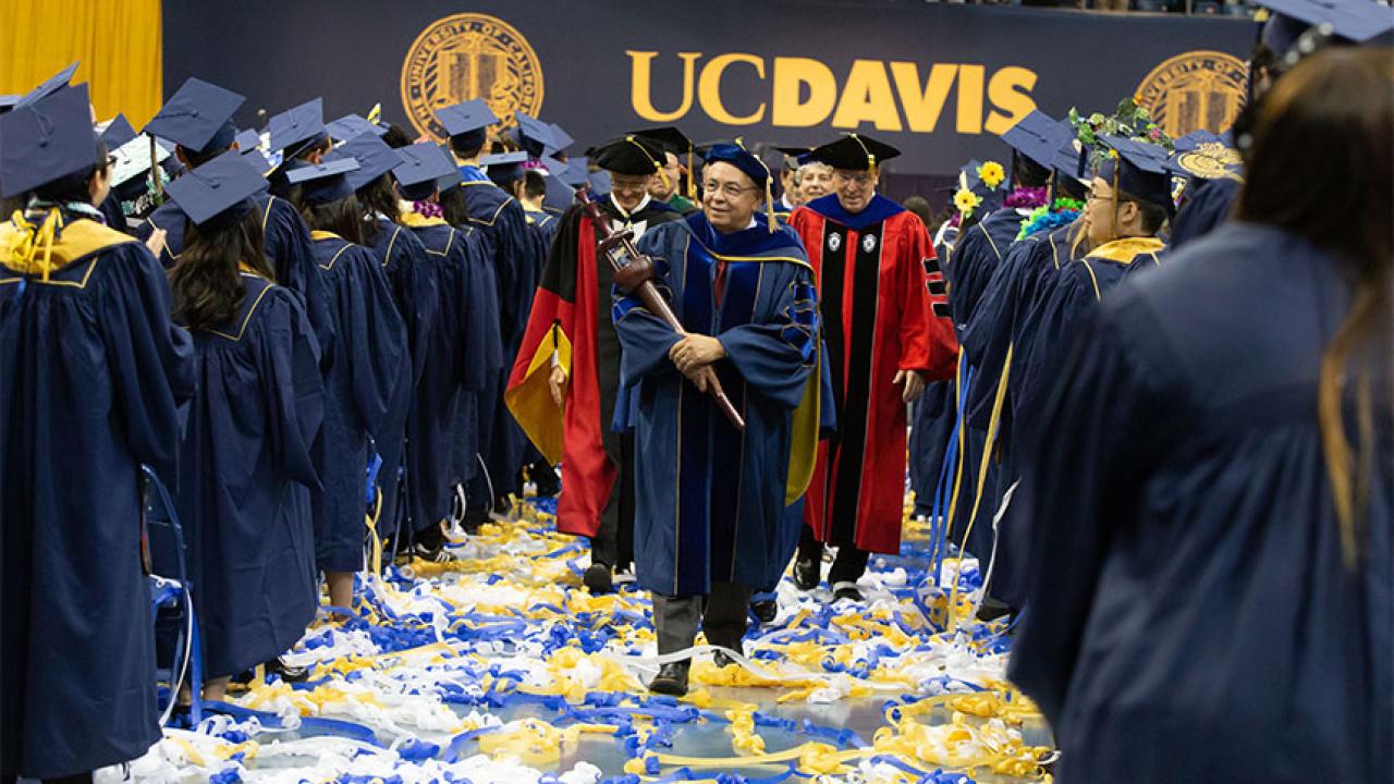 Professor Raymond Rodriguez leads the recession at the College of Biological Sciences&rsquo; commencement