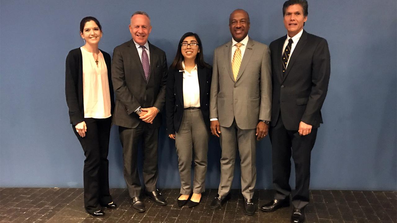 Panelists at a UC Regents meeting.