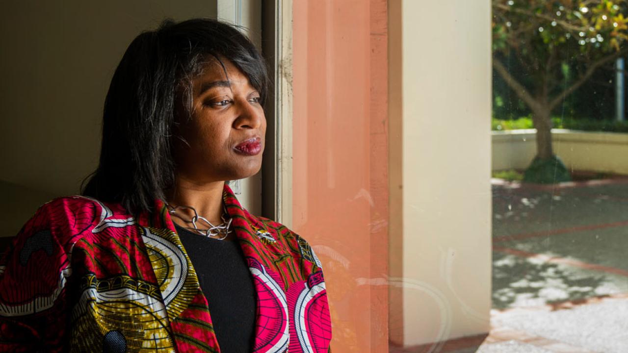 Vice Chancellor Renetta Garrison Tull, standing under one of the Mrak Hall entry archways.ss